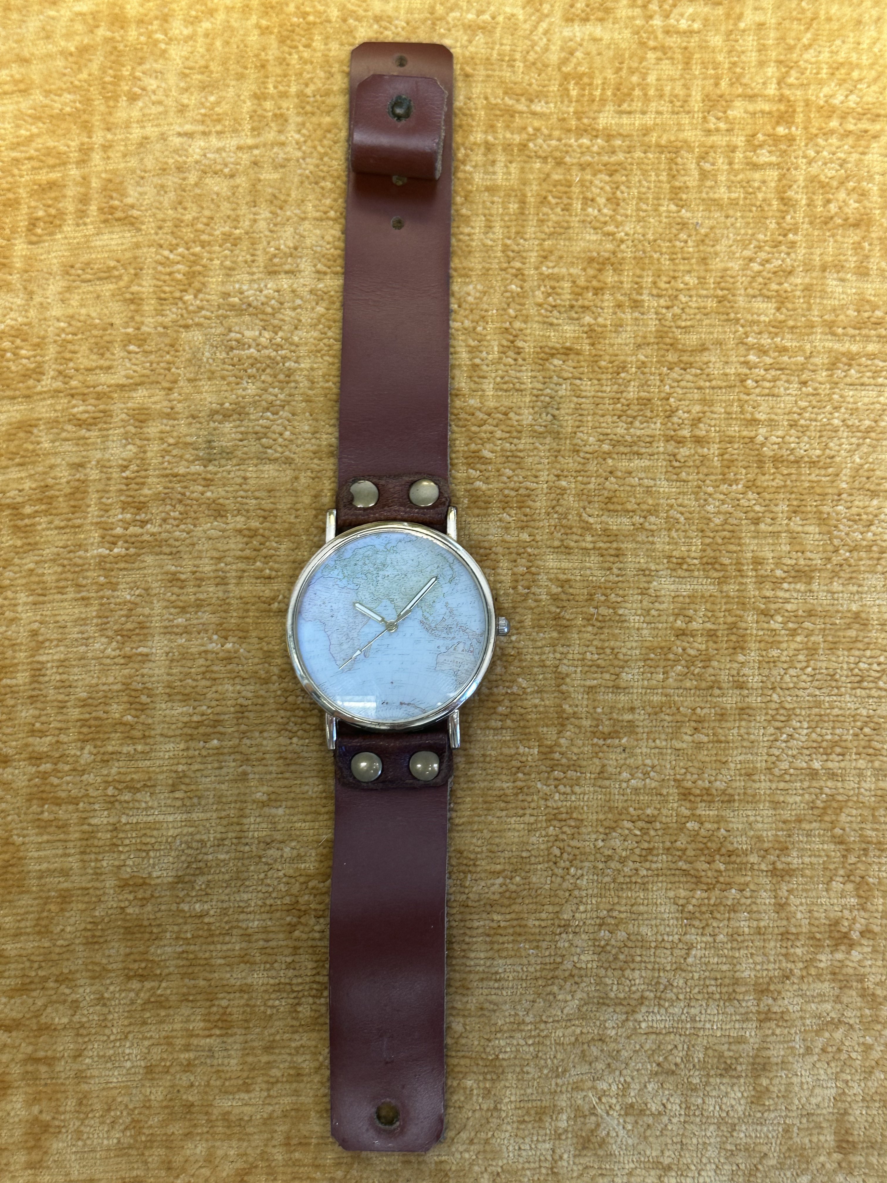 Unbranded World Map Dial Cuff Watch - angle 1